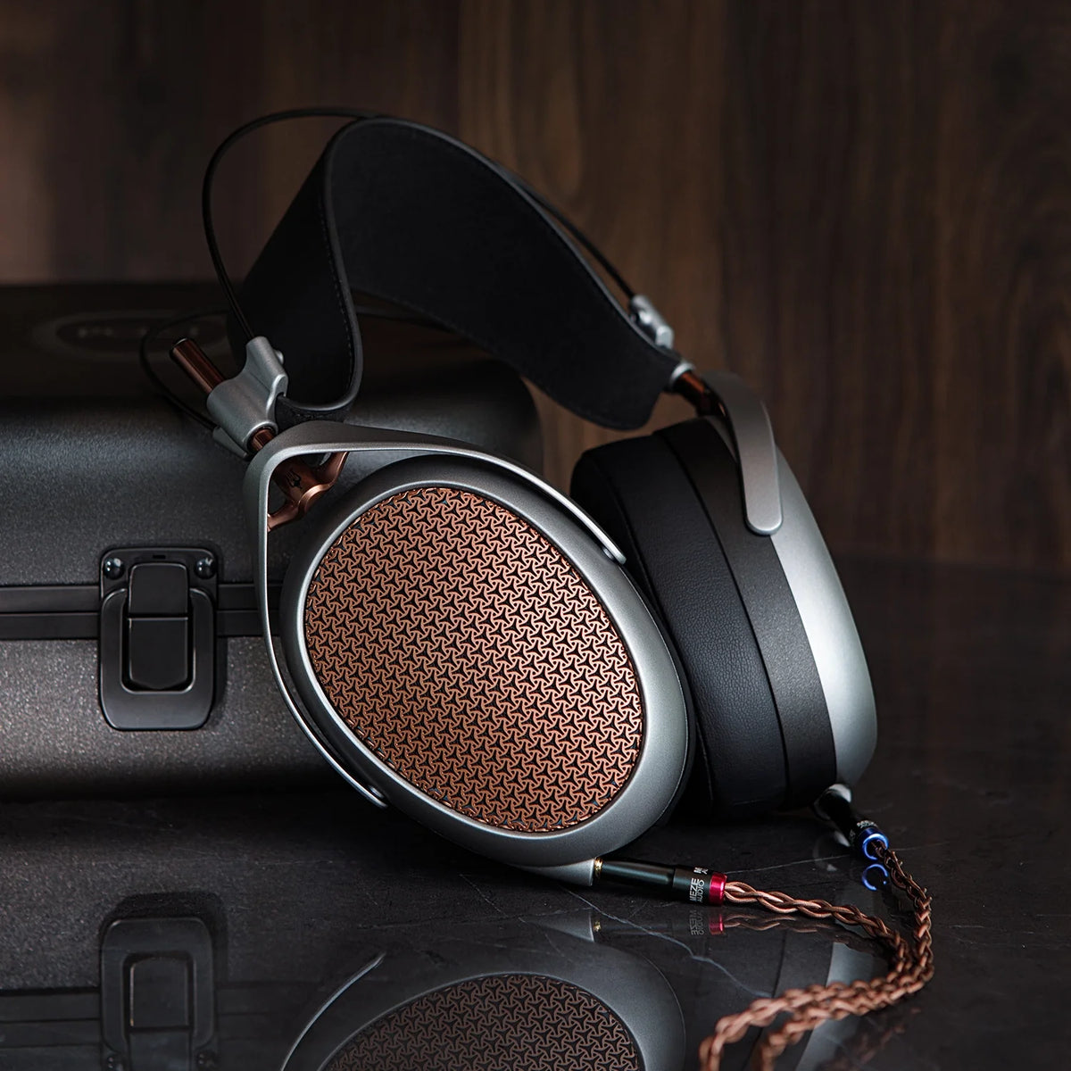 Meze Audio POET, resting on its case with the cable