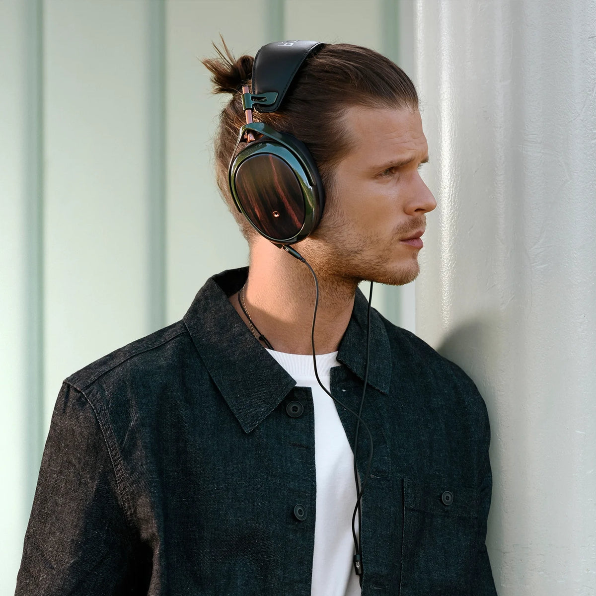 Meze Audio STRADA, worn by a listener