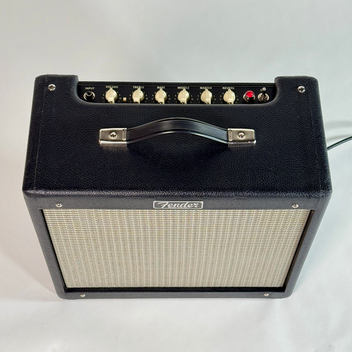Used Fender Blues Junior IV, top panel with the controls and handle