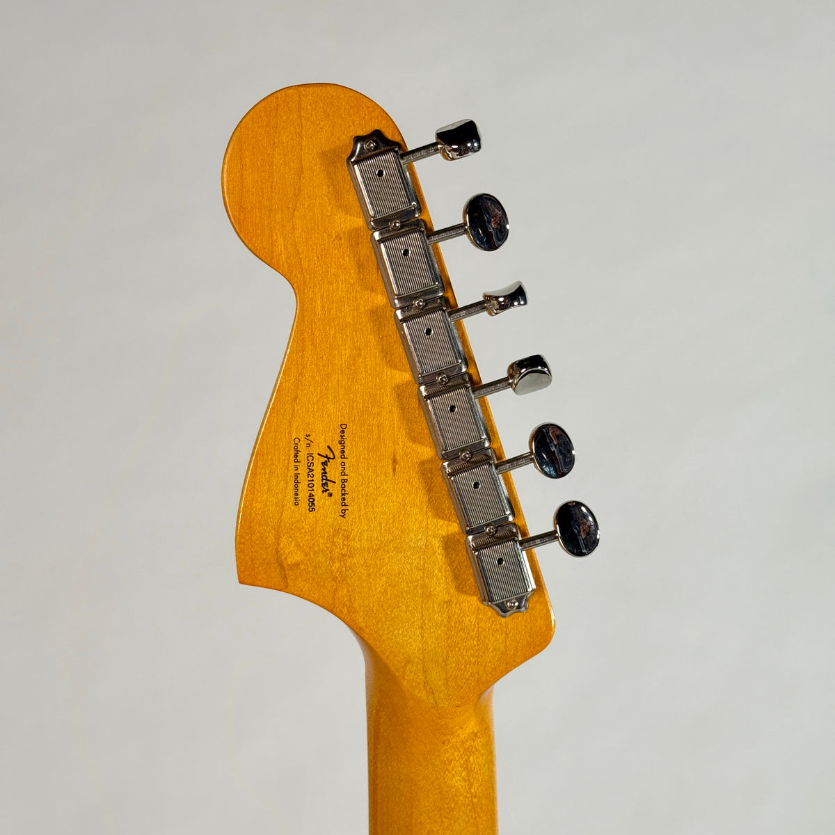 Used Squier Bass VI in black, back of the headstock