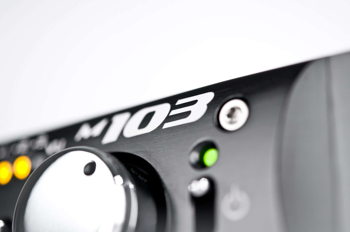 Grace Design m103, close up of the front panel badge and controls