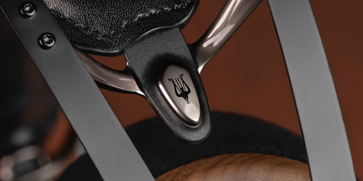 Meze Audio 105 SILVA, close up of the yoke and its lyre badge