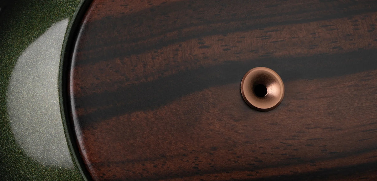 Meze Audio STRADA, close up of the wood earcup and its copper screw