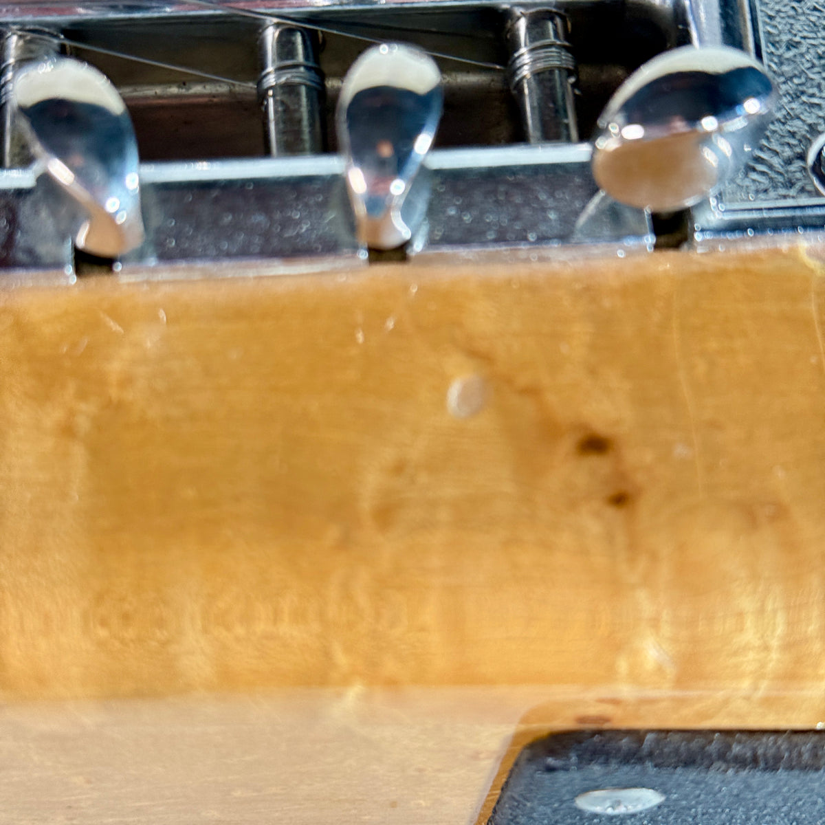 Used Sho-Bud Maverick pedal steel, close up of a mark on the birdseye maple body
