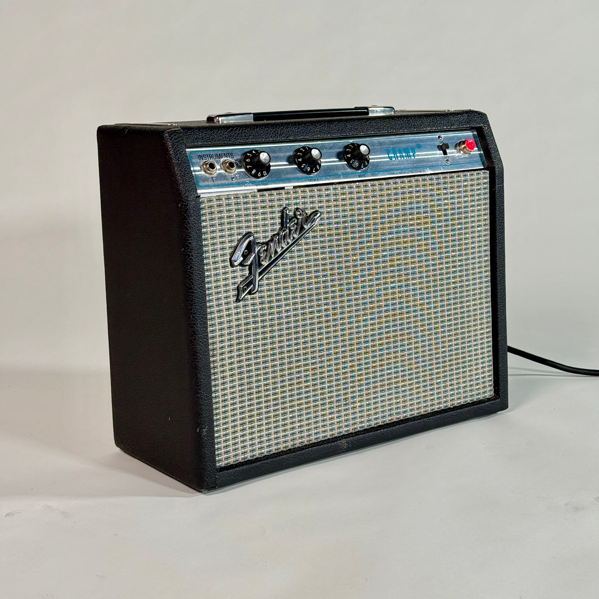 Used silverface Fender Champ, angled view from the left