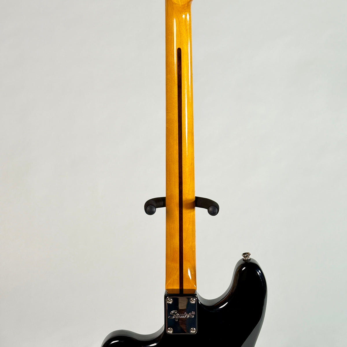 Used Squier Bass VI in black, back of the neck