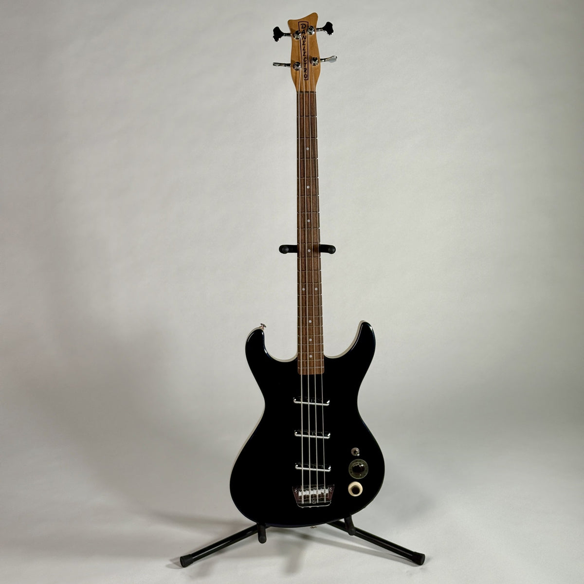 Used Danelectro Hodad bass in Blue Metalflake, full length, front, on a stand