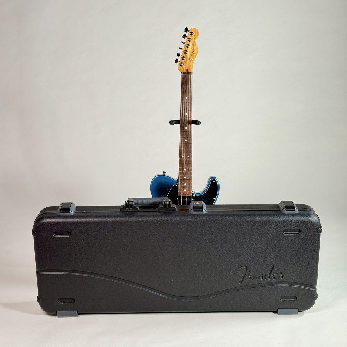 Used 2021 Fender American Professional II Telecaster in Dark Night, standing behind its Fender hardshell case