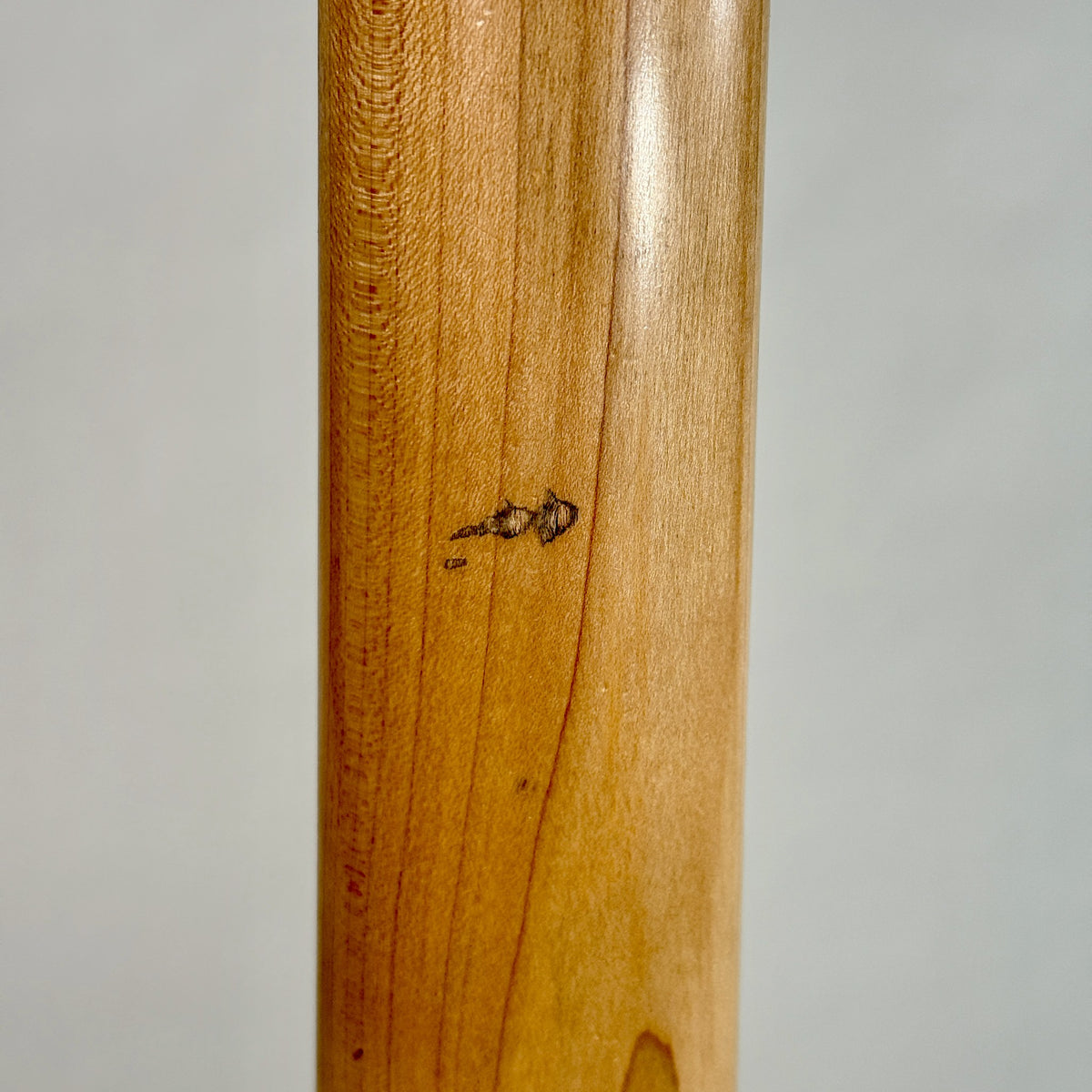 Used G&L Tribute L-2500 five-string bass, natural, close up of a mark on the back of the neck