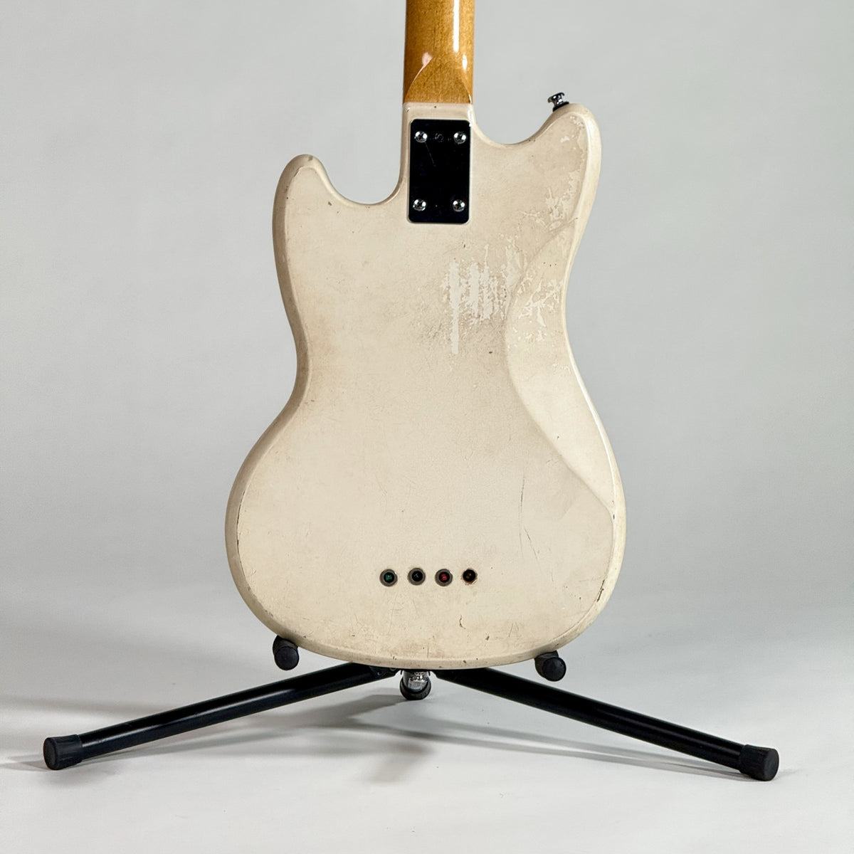 Used Kalamazoo bass in white, back of the body, closer