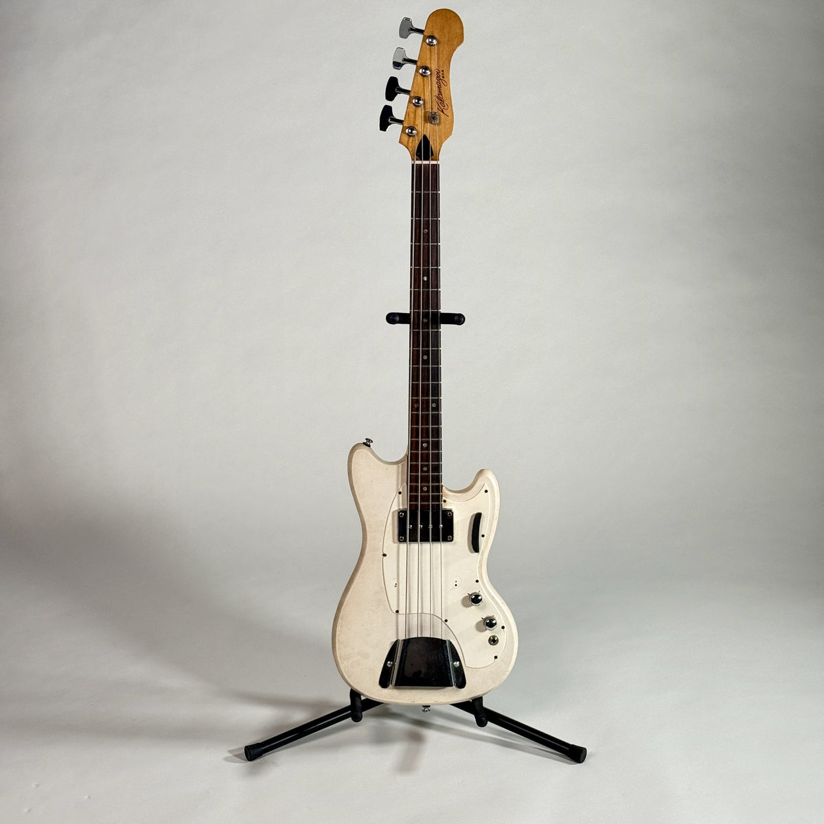 Used Kalamazoo bass in white, full length, front, on a stand