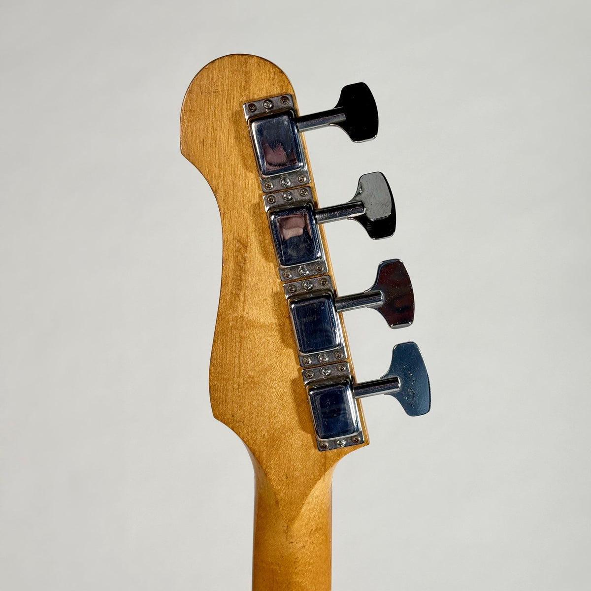 Used Kalamazoo bass in white, back of the headstock
