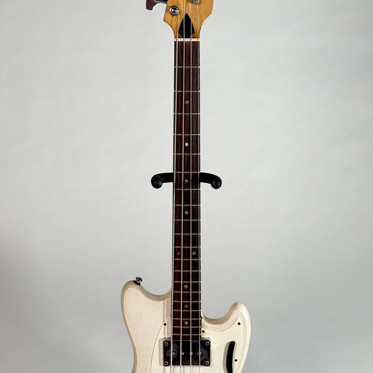 Used Kalamazoo bass in white, front of the neck