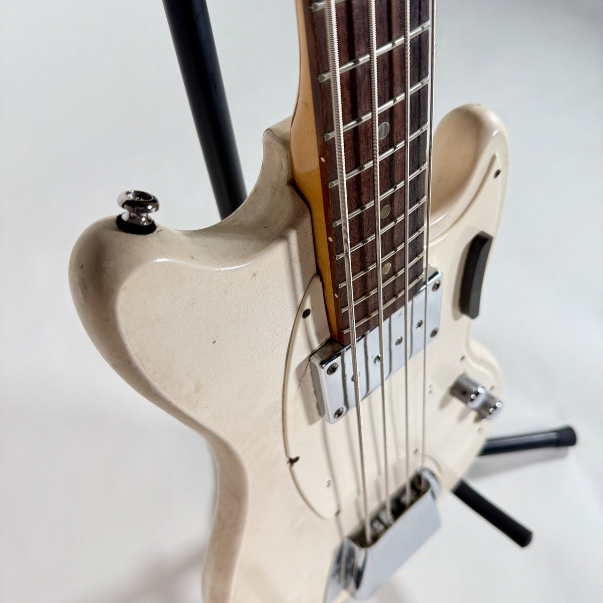 Used Kalamazoo bass in white, angled view of the body from the bass side