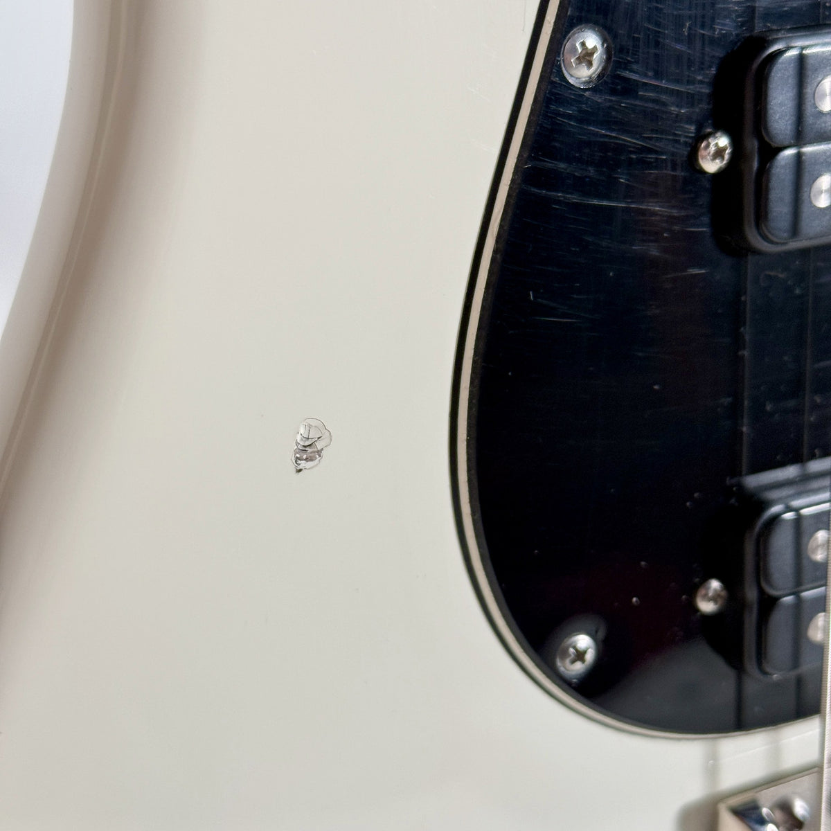 Used 2012 PRS NF3 in Antique White, close up of a small mark beside the pickguard