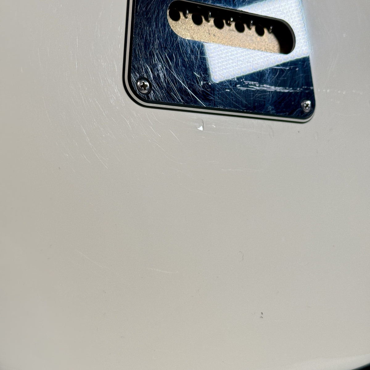 Used 2012 PRS NF3 in Antique White, close up of the finish on the back near the cavity cover
