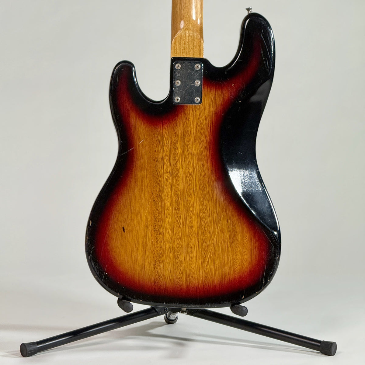 Used unbranded P-bass style bass in sunburst, back of the body