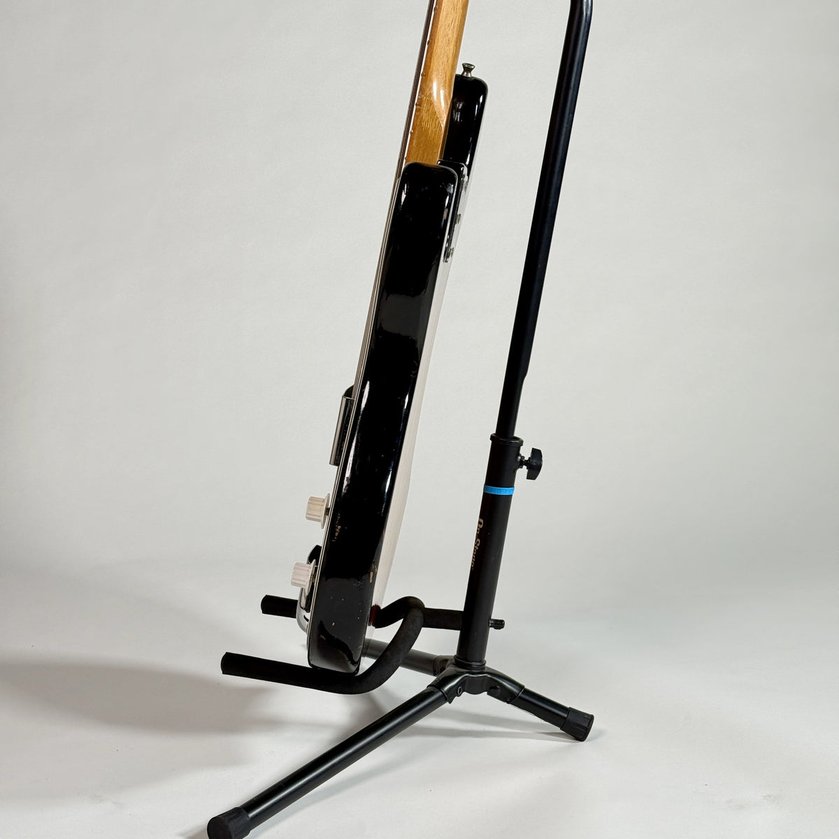 Used unbranded P-bass style bass in sunburst, edge of the body from one side
