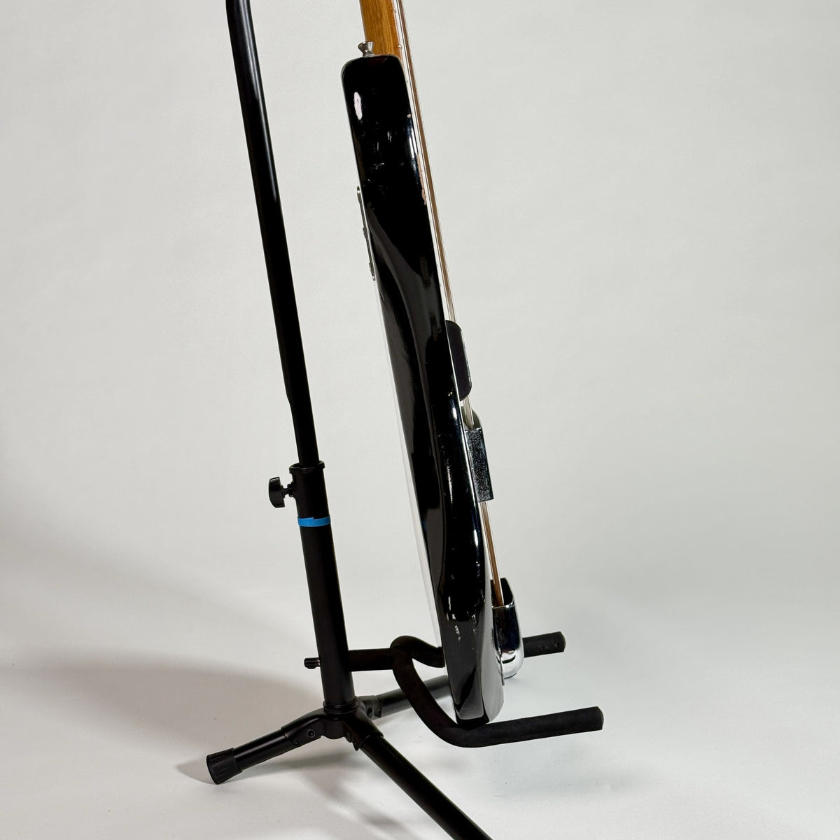 Used unbranded P-bass style bass in sunburst, edge of the body from the other side