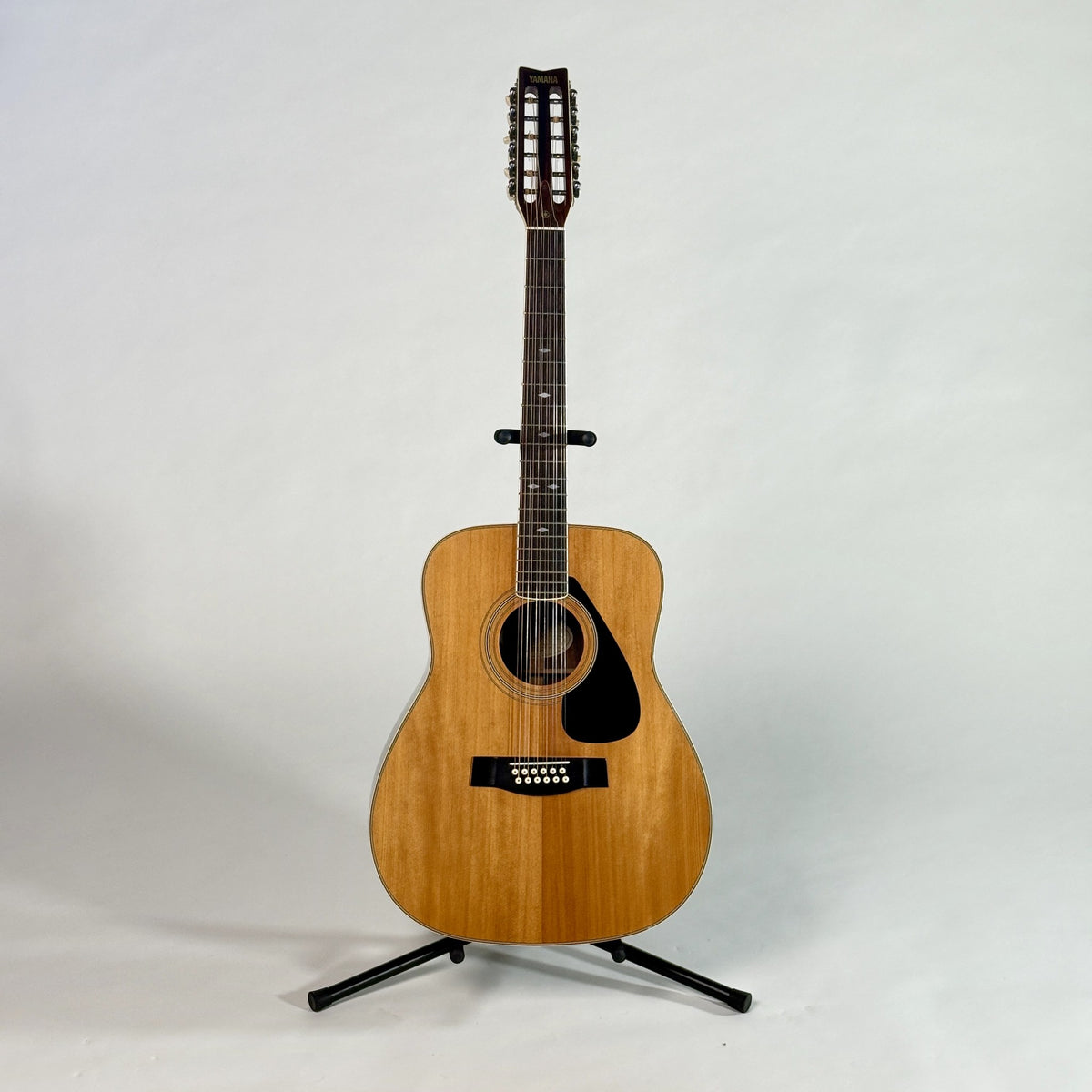 Used Yamaha FG-512 12-string dreadnought, full length, front, on a stand