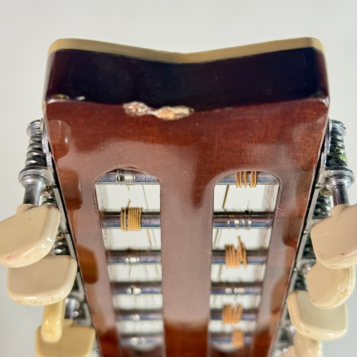 Used Yamaha FG-512 12-string dreadnought, close up of the end of the headstock and its wear